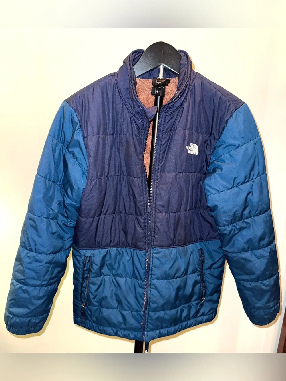 The North Face reversible puffer jacket with a soft, fleece lining, size 14/16